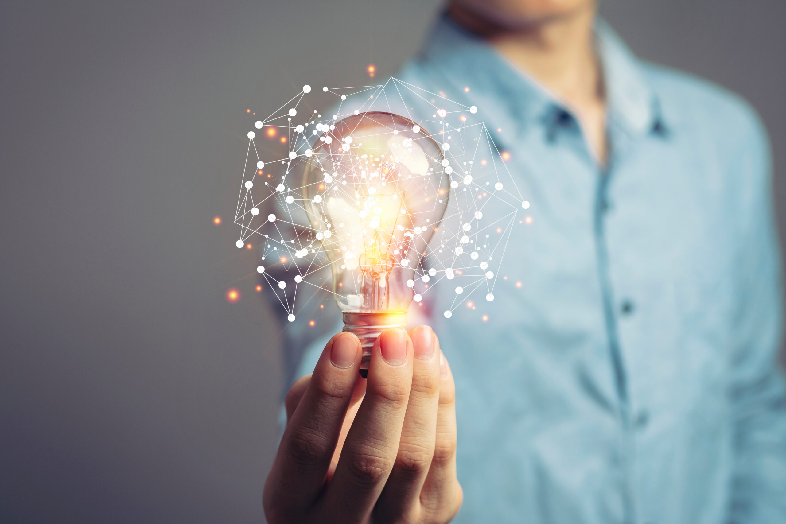 Man,Holding,Light,Bulbs,,Ideas,Of,New,Ideas,With,Innovative